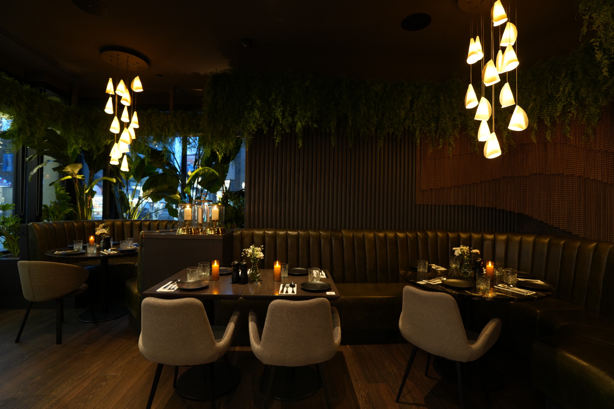 Candlelit interior of Miraas Downtown Vancouver
